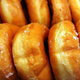 Row of classic glazed doughnuts